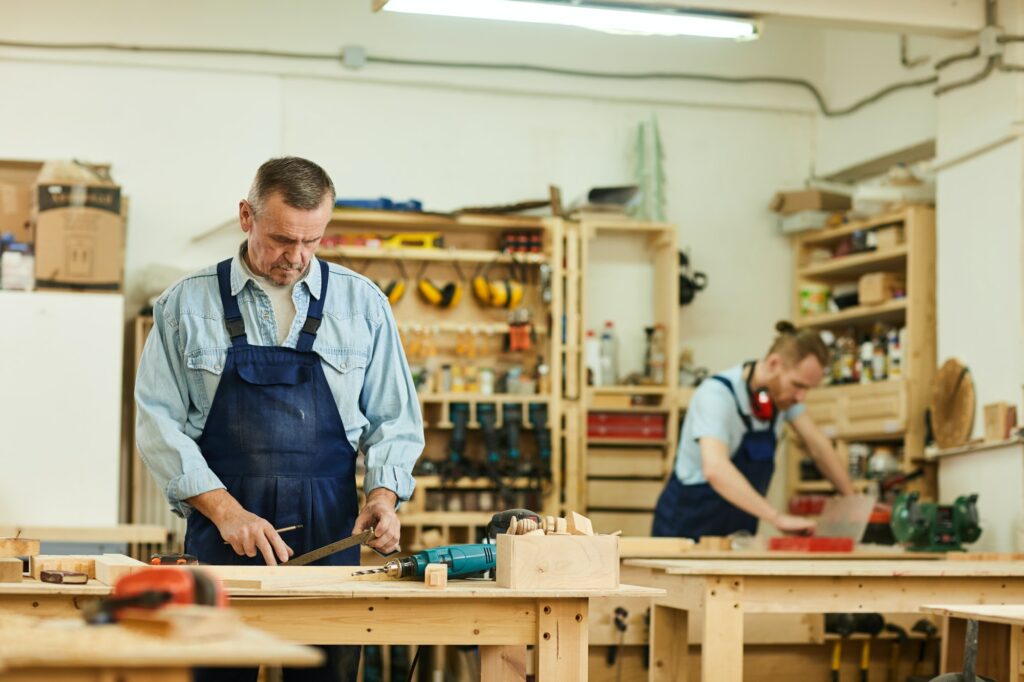 Carpenters Assembling Furniture